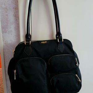 MZ Wallace black bag, deep zippered pockets both sides, multiple smaller pockets
